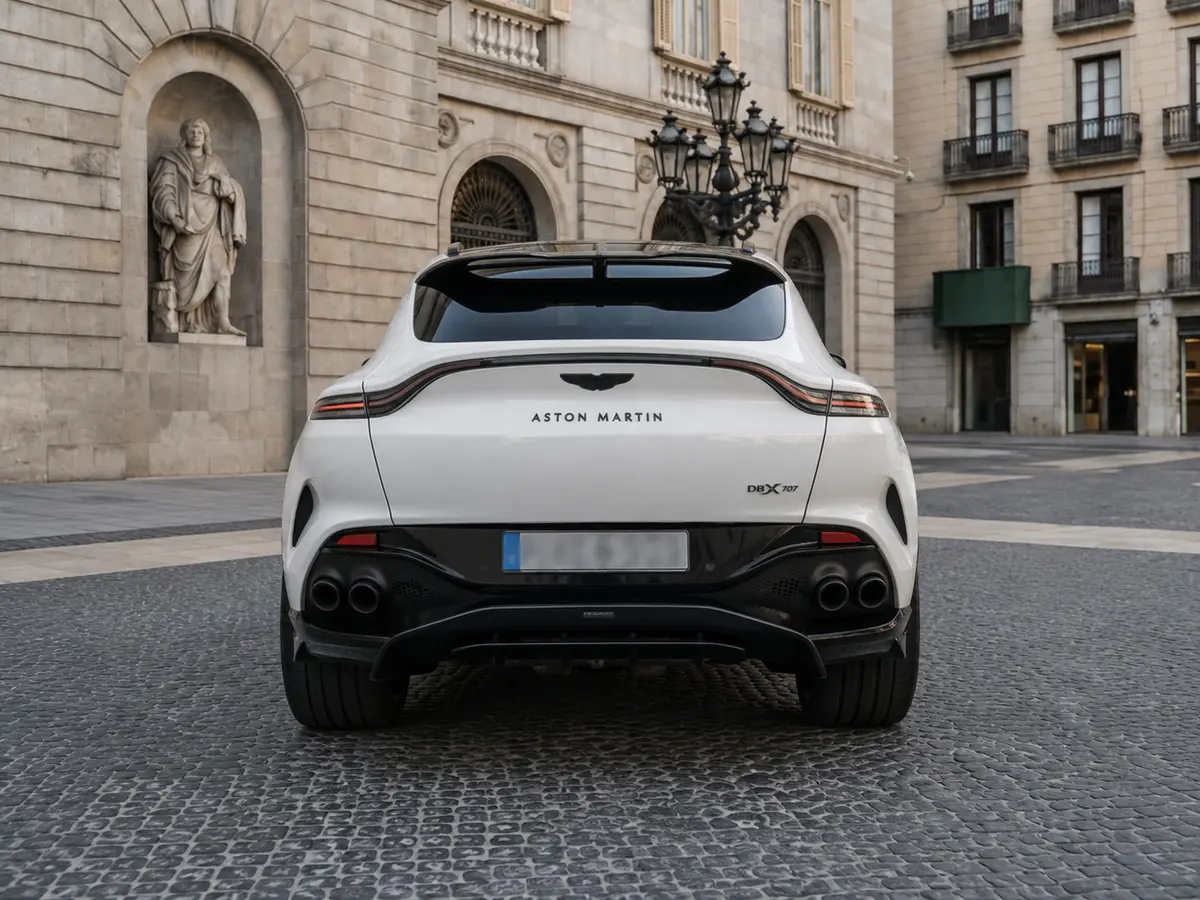 Aston Martin DBX 707 2026, rear view — Barcelona Luxury Car Rental, Barcelona. The Aston Martin DBX 707 pairs 707 hp with a five-seat cabin, a combination few SUVs in…