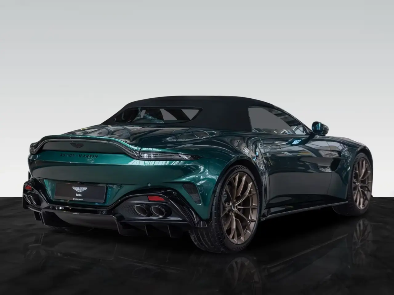 Aston Martin Vantage V8 Spider 2026, rear view — Barcelona Luxury Car Rental, Barcelona. The 2026 Aston Martin Vantage V8 Spider pairs a 665 hp V8 with an open cabin, a…