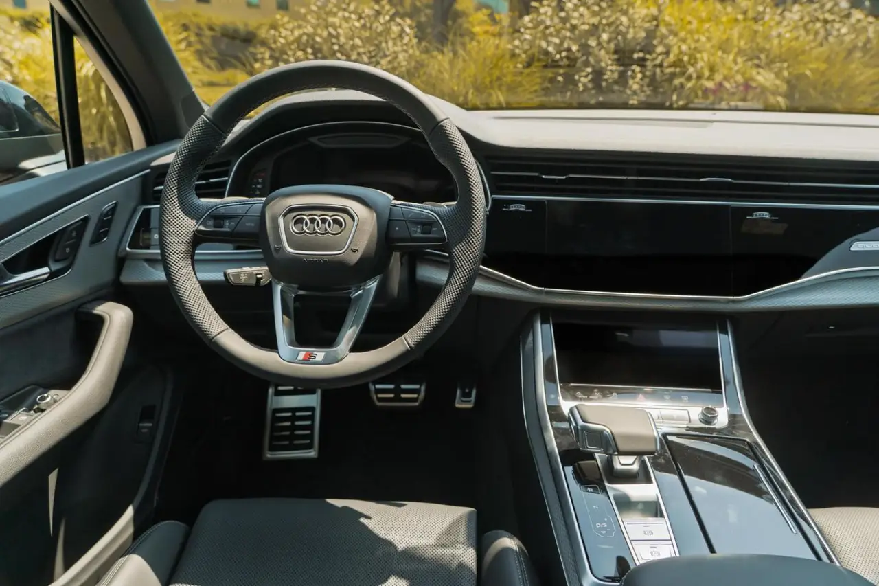Audi Q7 50 TDI S-Line Edition 2025, interior — Barcelona Luxury Car Rental, Barcelona. The Audi Q7 50 TDI S-Line Edition brings a different kind of presence to the fleet: a…