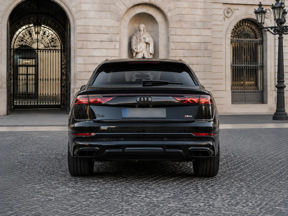 Audi Q8 2025, rear view — Barcelona Luxury Car Rental, Barcelona. The 2025 Audi Q8 sits in the fleet as the quiet, capable choice for clients who want SUV…