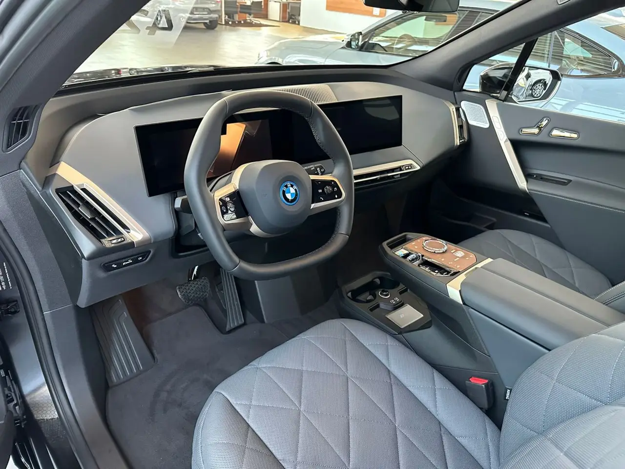 BMW IX M60 2023, exterior — Barcelona Luxury Car Rental, Barcelona. The BMW iX M60 brings 619 hp to a fully electric SUV body, and the difference is…