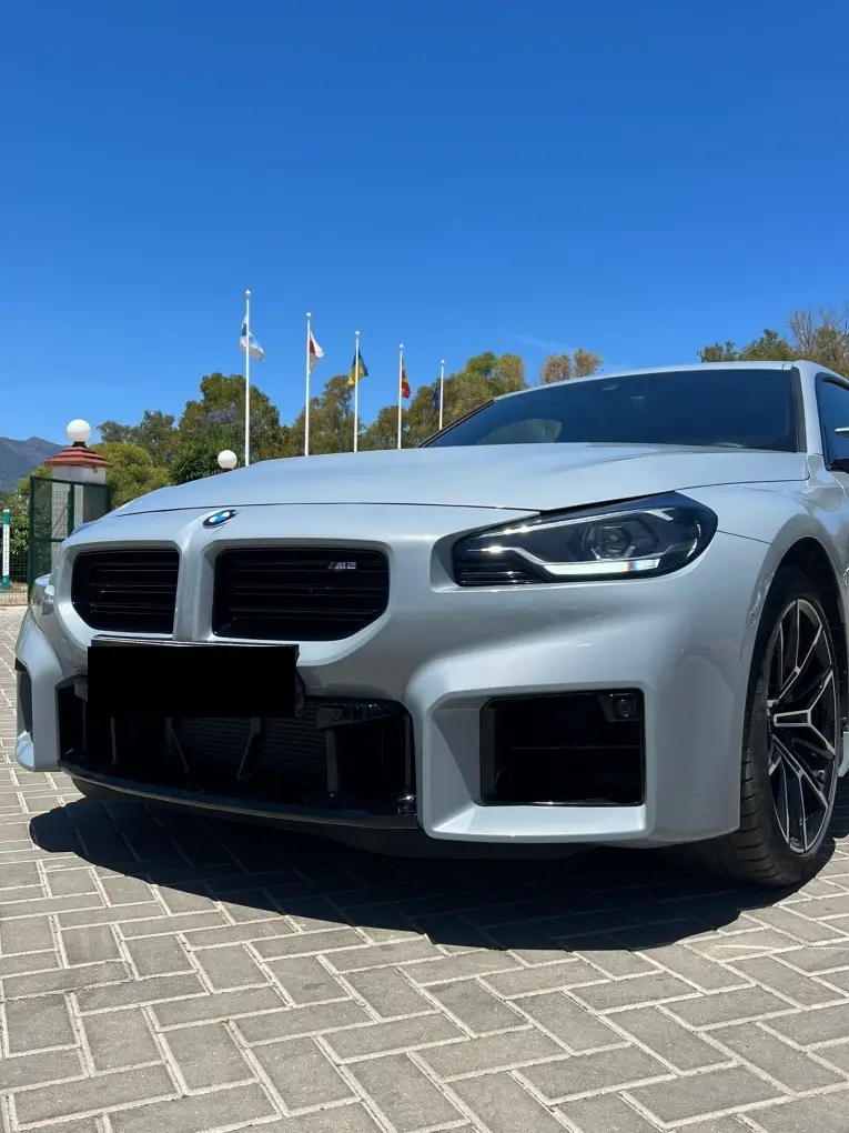 BMW M2 2024, exterior — Barcelona Luxury Car Rental, Barcelona. The 2024 BMW M2 is the compact end of a performance line, and it drives like it: 460 hp…
