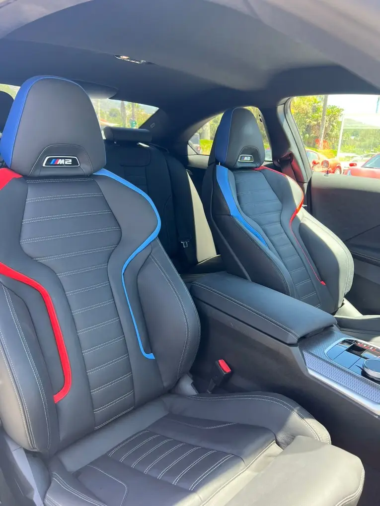 BMW M2 2024, rear view — Barcelona Luxury Car Rental, Barcelona. The 2024 BMW M2 is the compact end of a performance line, and it drives like it: 460 hp…