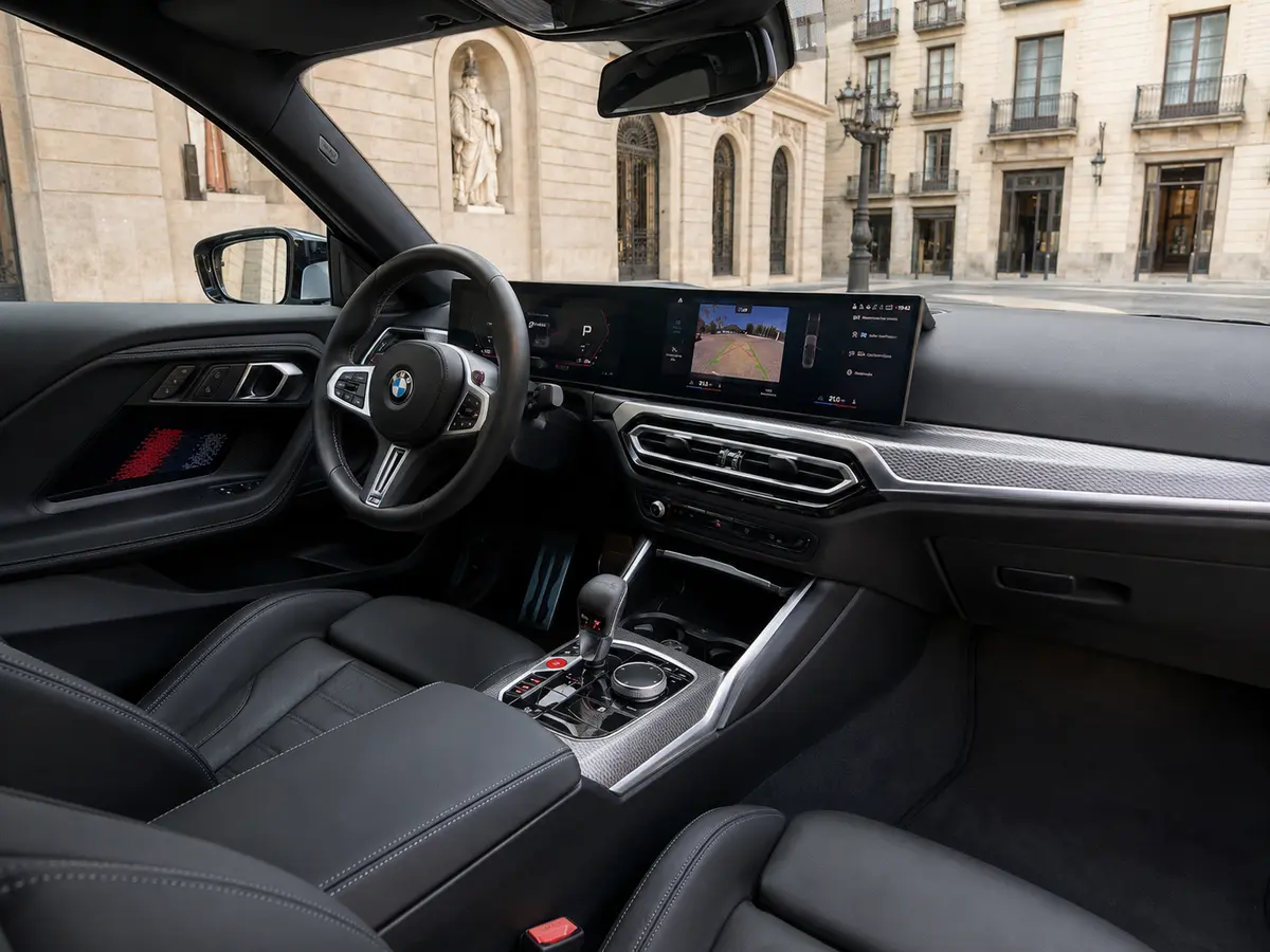 BMW M2 2024, interior — Barcelona Luxury Car Rental, Barcelona. The 2024 BMW M2 is the compact end of a performance line, and it drives like it: 460 hp…
