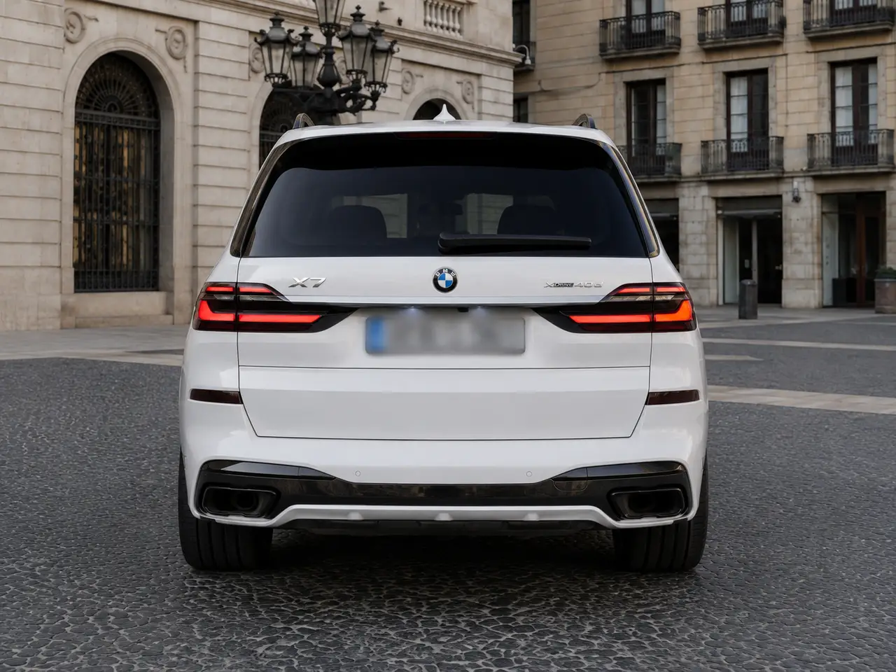 BMW X7 40d M 2024, rear view — Barcelona Luxury Car Rental, Barcelona. The 2024 BMW X7 40d M brings seven seats and 352 hp to a segment where most luxury SUVs…