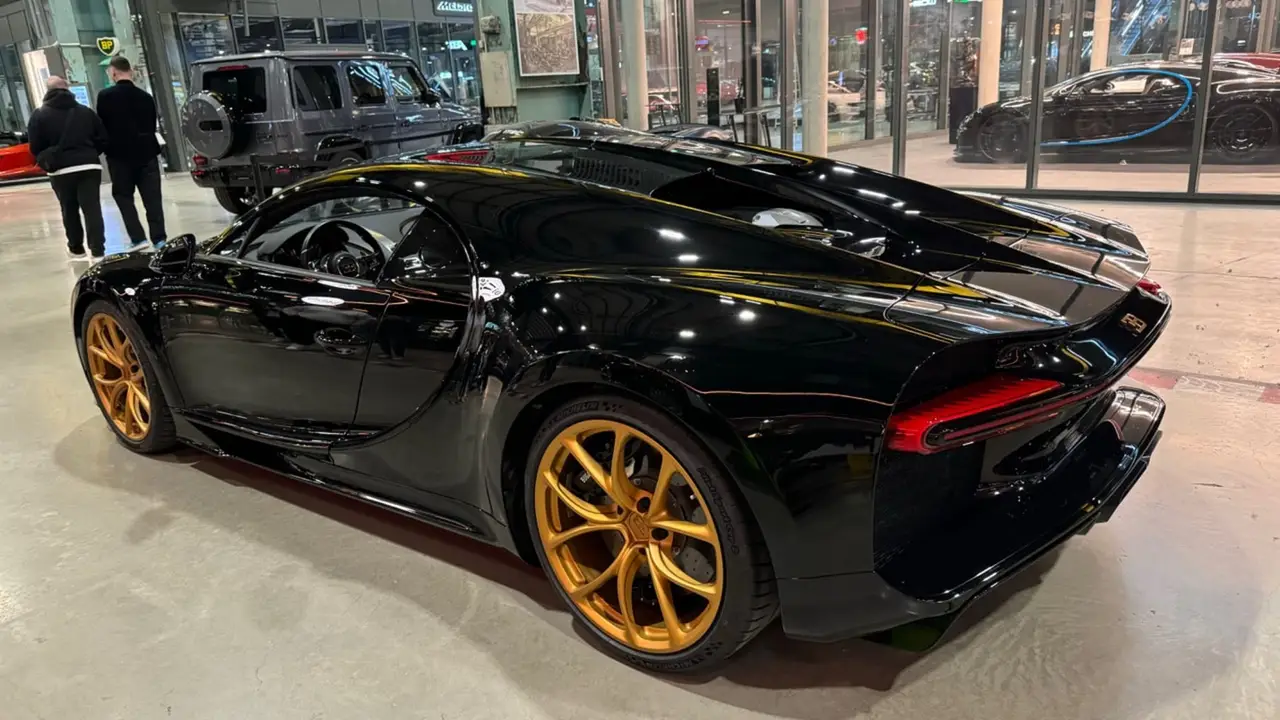 Bugatti Chiron 110 Ani 2019, exterior — Barcelona Luxury Car Rental, Barcelona. The 2019 Bugatti Chiron 110 Ans is one of the rarest cars in the collection, built to…