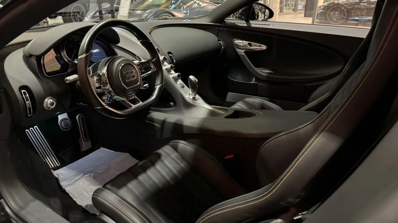 Bugatti Chiron 110 Ani 2019, rear view — Barcelona Luxury Car Rental, Barcelona. The 2019 Bugatti Chiron 110 Ans is one of the rarest cars in the collection, built to…
