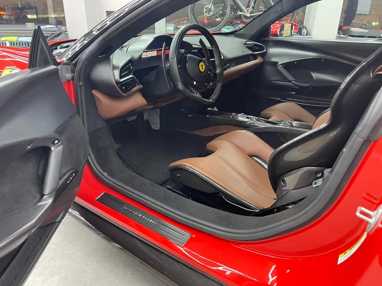 Ferrari 296 GTB 2023, exterior — Barcelona Luxury Car Rental, Barcelona. The Ferrari 296 GTB pairs a twin-turbo V6 with hybrid assistance to produce 830 hp, a…