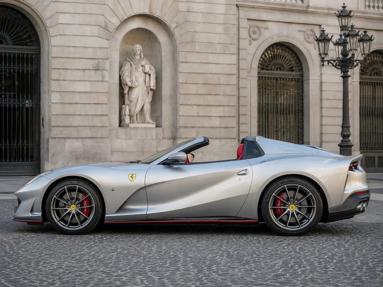 Ferrari 812 GTS 2024, exterior — Barcelona Luxury Car Rental, Barcelona. The Ferrari 812 GTS pairs a naturally aspirated V12 with a retractable hard top,…