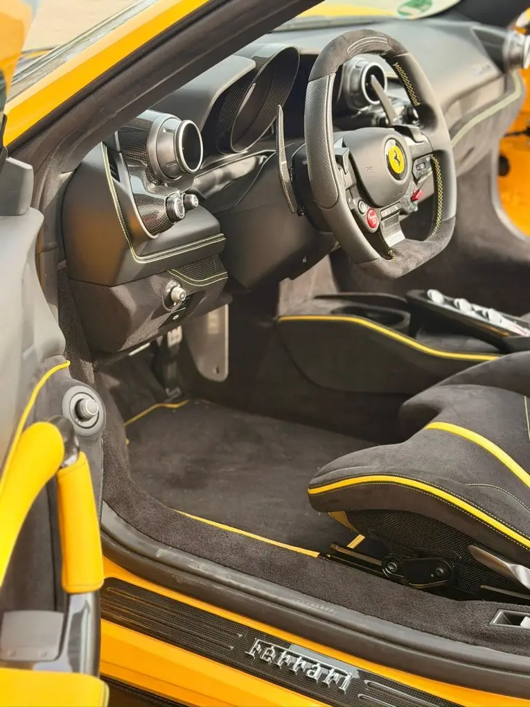 Ferrari F8 SPIDER 2023, interior — Barcelona Luxury Car Rental, Barcelona. The Ferrari F8 Spider pairs a 720 hp twin-turbo V8 with a retractable hard top, giving…
