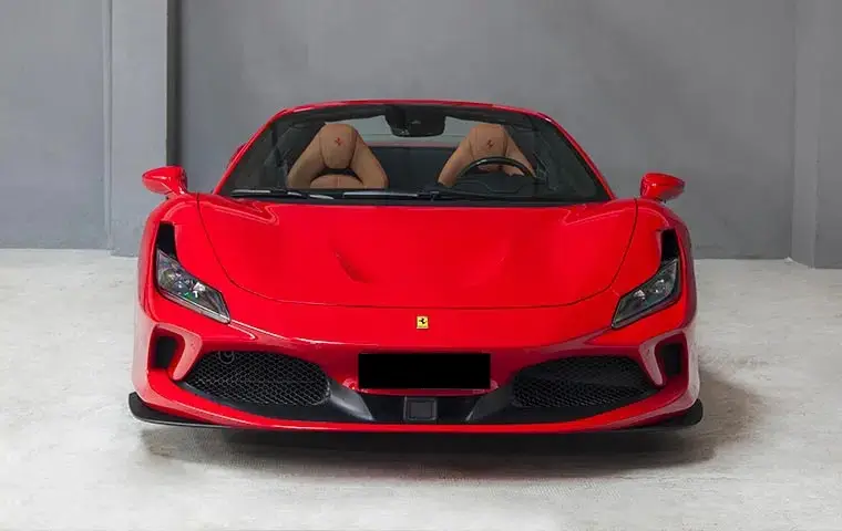 Ferrari F8 Tributo Spider Red 2023, exterior — Barcelona Luxury Car Rental, Barcelona. The Ferrari F8 Tributo Spider in red pairs a twin-turbocharged V8 producing 720 hp with a…