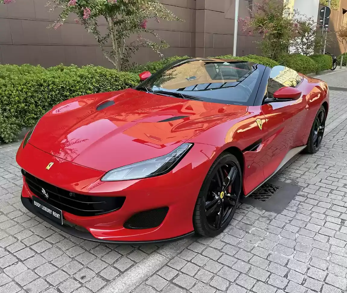 Ferrari Portofino M 2023, rear view — Barcelona Luxury Car Rental, Barcelona. The Ferrari Portofino M carries 620 hp inside a genuine four-seat convertible cabin, a…