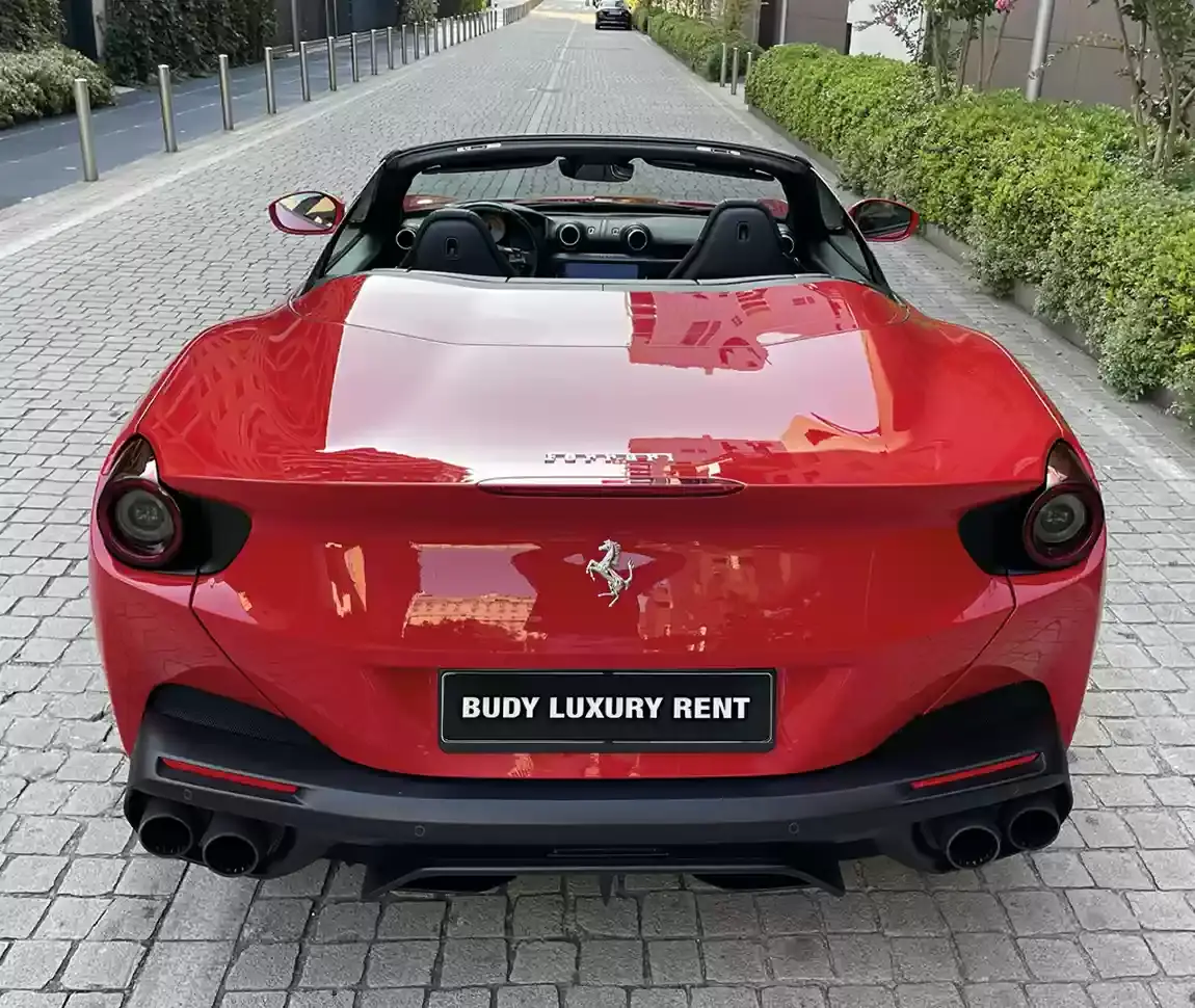 Ferrari Portofino M 2023, side profile — Barcelona Luxury Car Rental, Barcelona. The Ferrari Portofino M carries 620 hp inside a genuine four-seat convertible cabin, a…