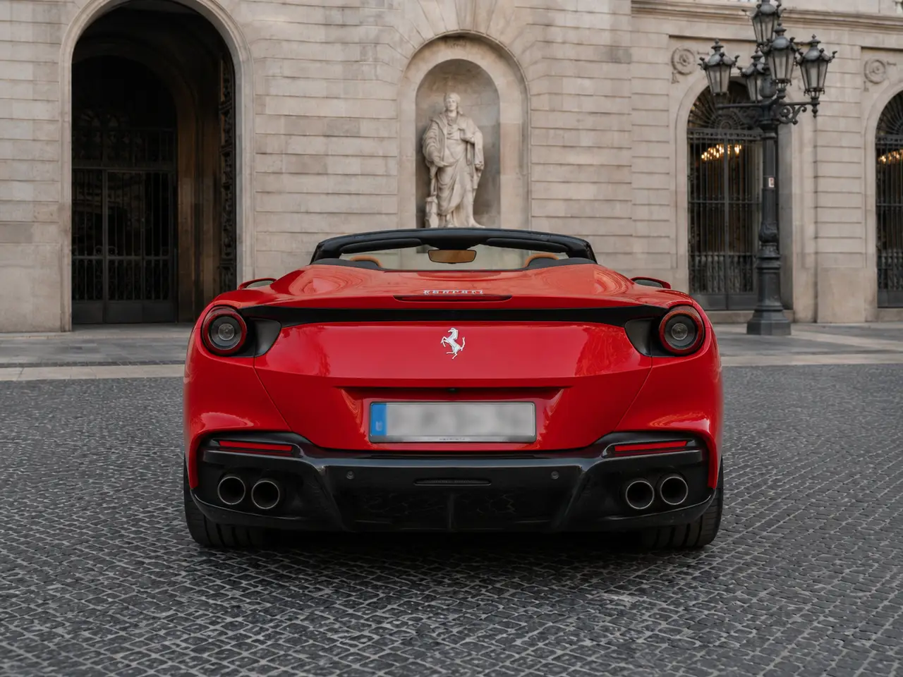 Ferrari Portofino M 2023, rear view — Barcelona Luxury Car Rental, Barcelona. The Ferrari Portofino M carries 620 hp inside a genuine four-seat convertible cabin, a…