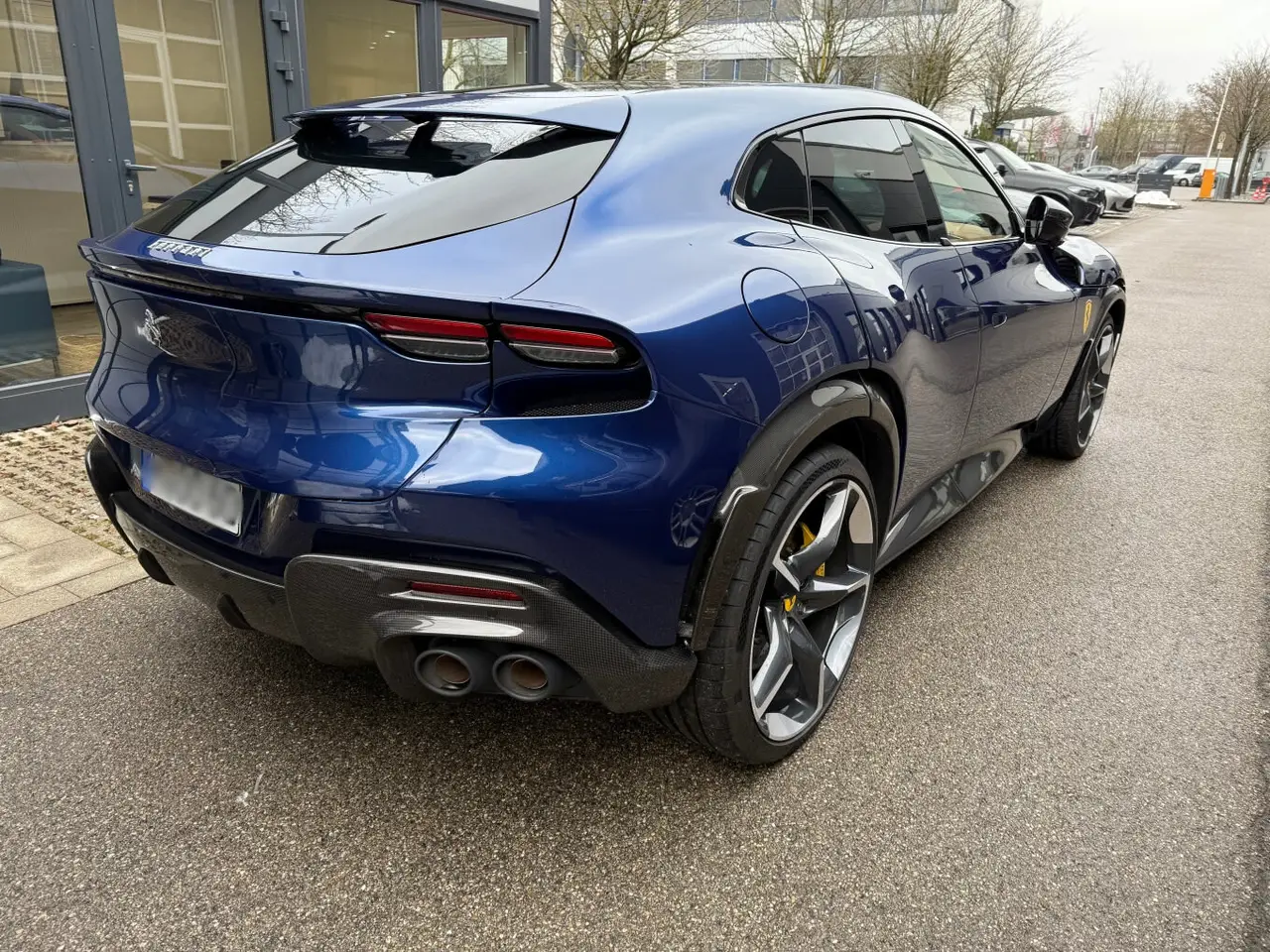 Ferrari Purosangue 2024, exterior — Barcelona Luxury Car Rental, Barcelona. The Ferrari Purosangue occupies a category of its own within the marque's line-up: five…