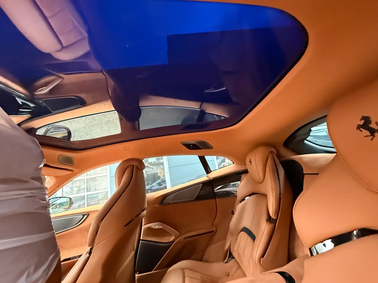 Ferrari Purosangue 2024, interior — Barcelona Luxury Car Rental, Barcelona. The Ferrari Purosangue occupies a category of its own within the marque's line-up: five…