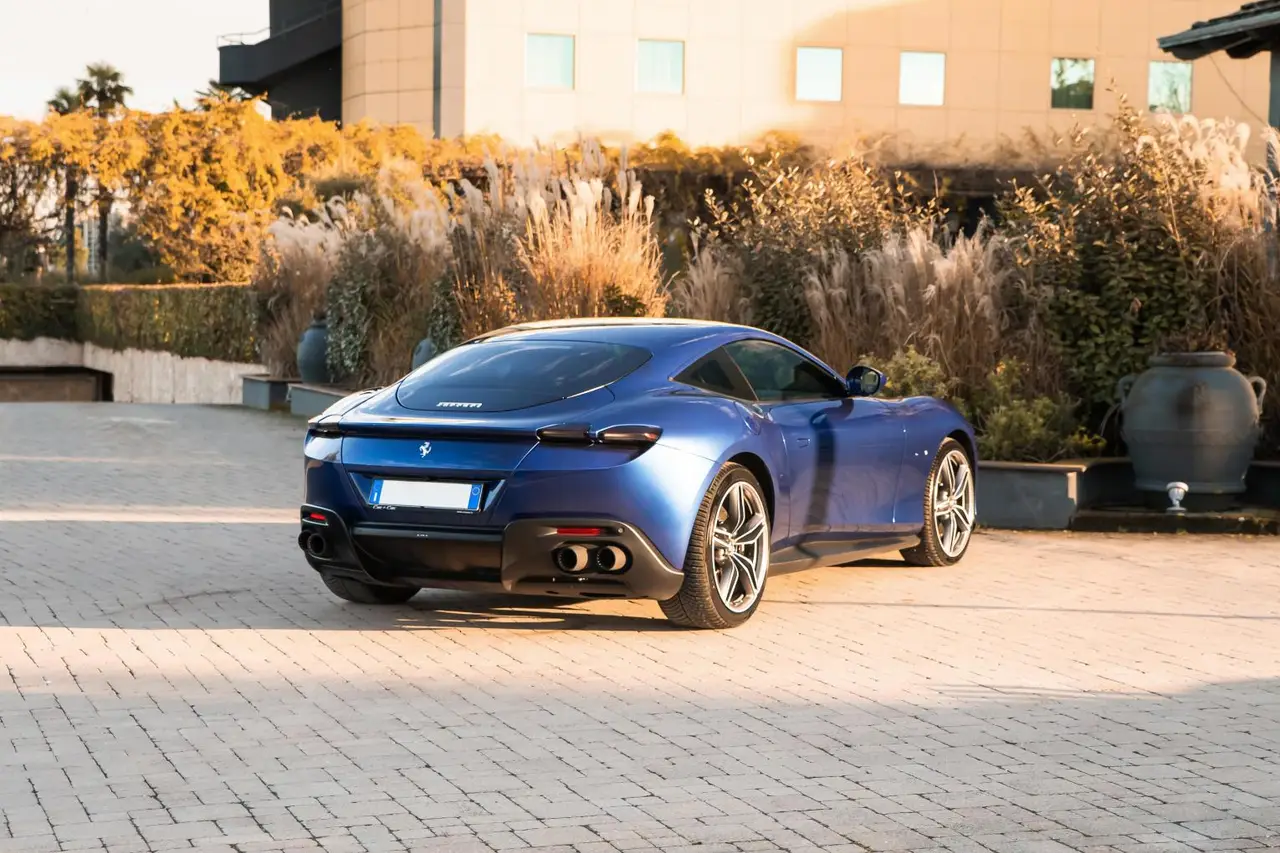 Ferrari Roma 2025, front view — Barcelona Luxury Car Rental, Barcelona. The Ferrari Roma sits apart from the marque's mid-engined coupés: a front-engined 2+2…
