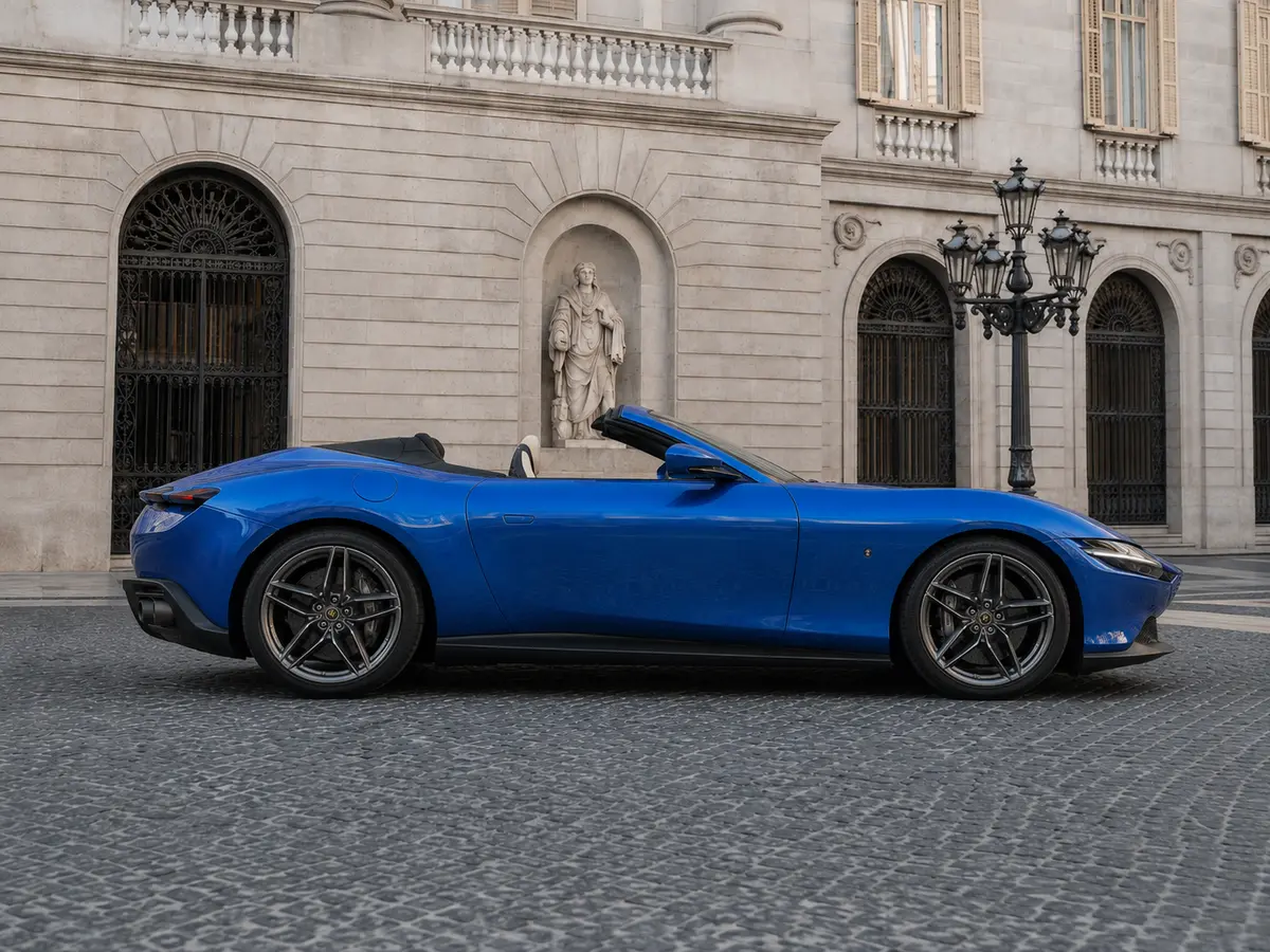 Ferrari Roma 2025, front view — Barcelona Luxury Car Rental, Barcelona. The Ferrari Roma sits apart from the marque's mid-engined coupés: a front-engined 2+2…