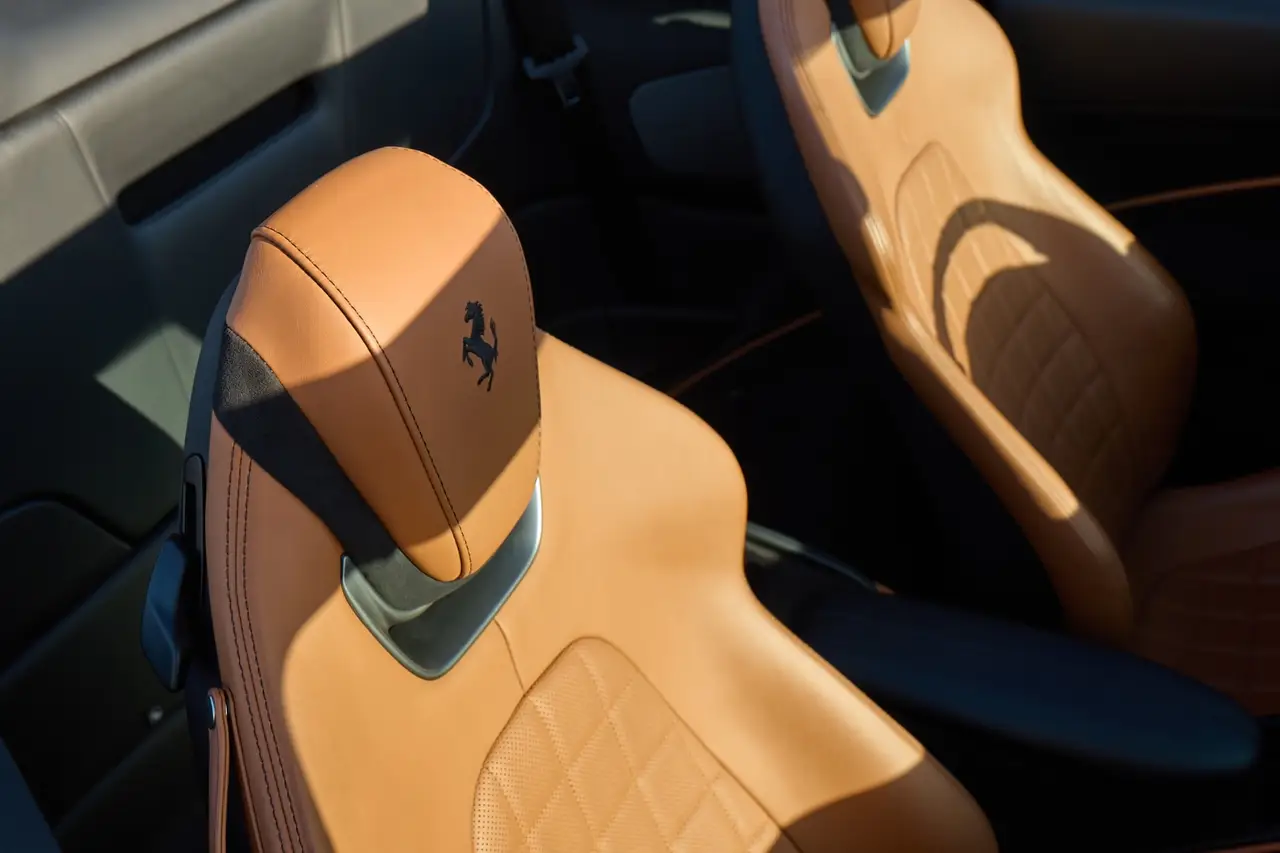 Ferrari Roma Spider 2024, interior — Barcelona Luxury Car Rental, Barcelona. The 2024 Ferrari Roma Spider pairs 620 hp with a folding soft top, giving it a dual…