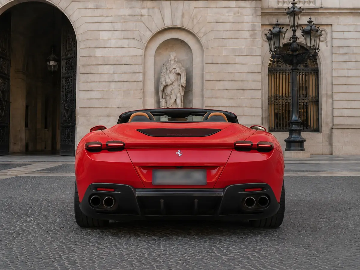 Ferrari Roma Spider 2024, rear view — Barcelona Luxury Car Rental, Barcelona. The 2024 Ferrari Roma Spider pairs 620 hp with a folding soft top, giving it a dual…