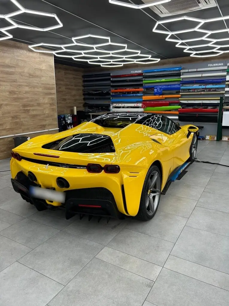 Ferrari SF90 Spider 2024, rear view — Barcelona Luxury Car Rental, Barcelona. The Ferrari SF90 Spider sits at the top of the marque's current range, pairing a…