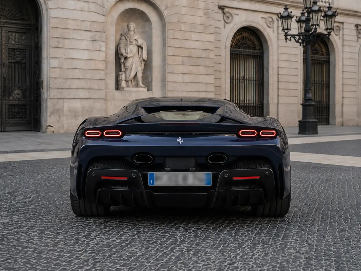 Ferrari SF90 Stradale 2025, rear view — Barcelona Luxury Car Rental, Barcelona. The Ferrari SF90 Stradale sits at the top of the marque's current range, pairing a…