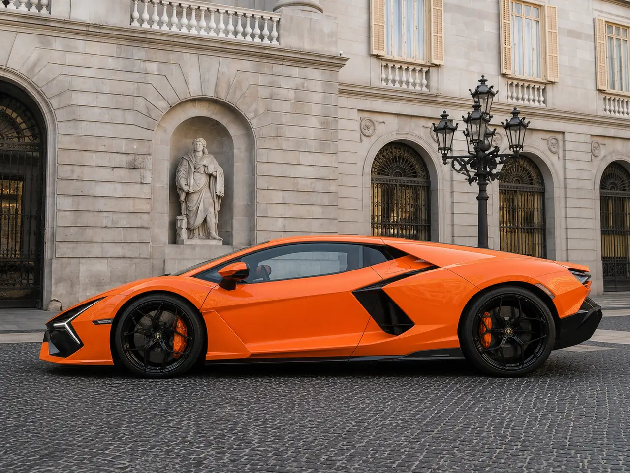 Lamborghini Revuelto 2026, exterior — Barcelona Luxury Car Rental, Barcelona. The Lamborghini Revuelto is the marque's current flagship, pairing a naturally aspirated…