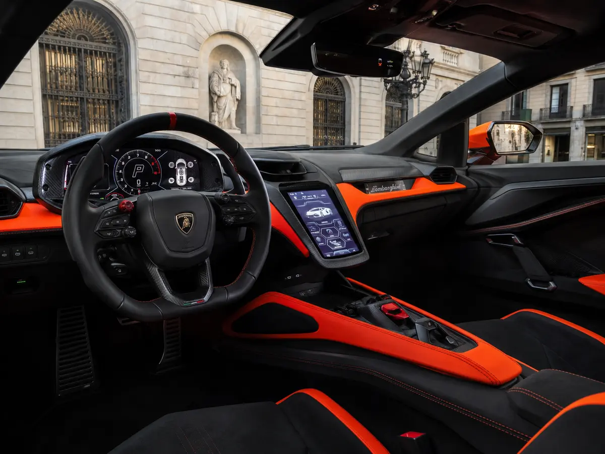 Lamborghini Revuelto 2026, interior — Barcelona Luxury Car Rental, Barcelona. The Lamborghini Revuelto is the marque's current flagship, pairing a naturally aspirated…