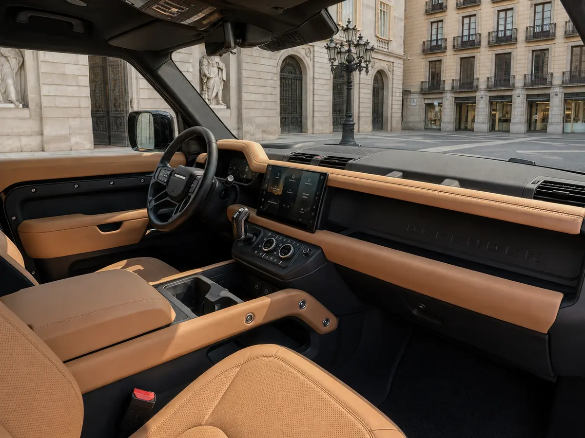 Land Rover Defender 2024, interior — Barcelona Luxury Car Rental, Barcelona. The 2024 Land Rover Defender in this fleet carries 400 hp and seats seven, which puts it…