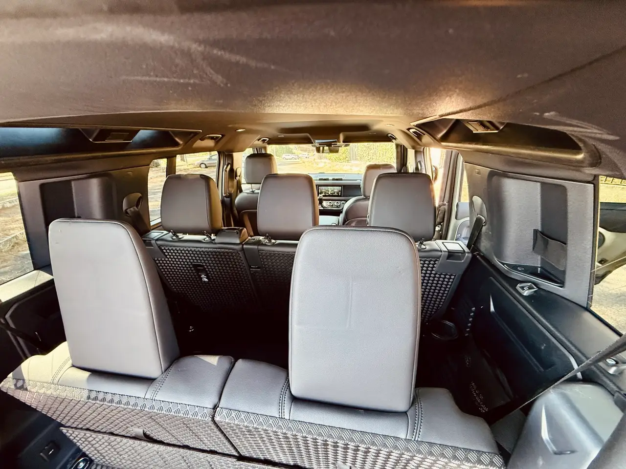 Land Rover Defender X-Dynamic 7 seater 2024, exterior — Barcelona Luxury Car Rental, Barcelona. The 2024 Land Rover Defender X-Dynamic seats seven and carries its 300 hp with the…