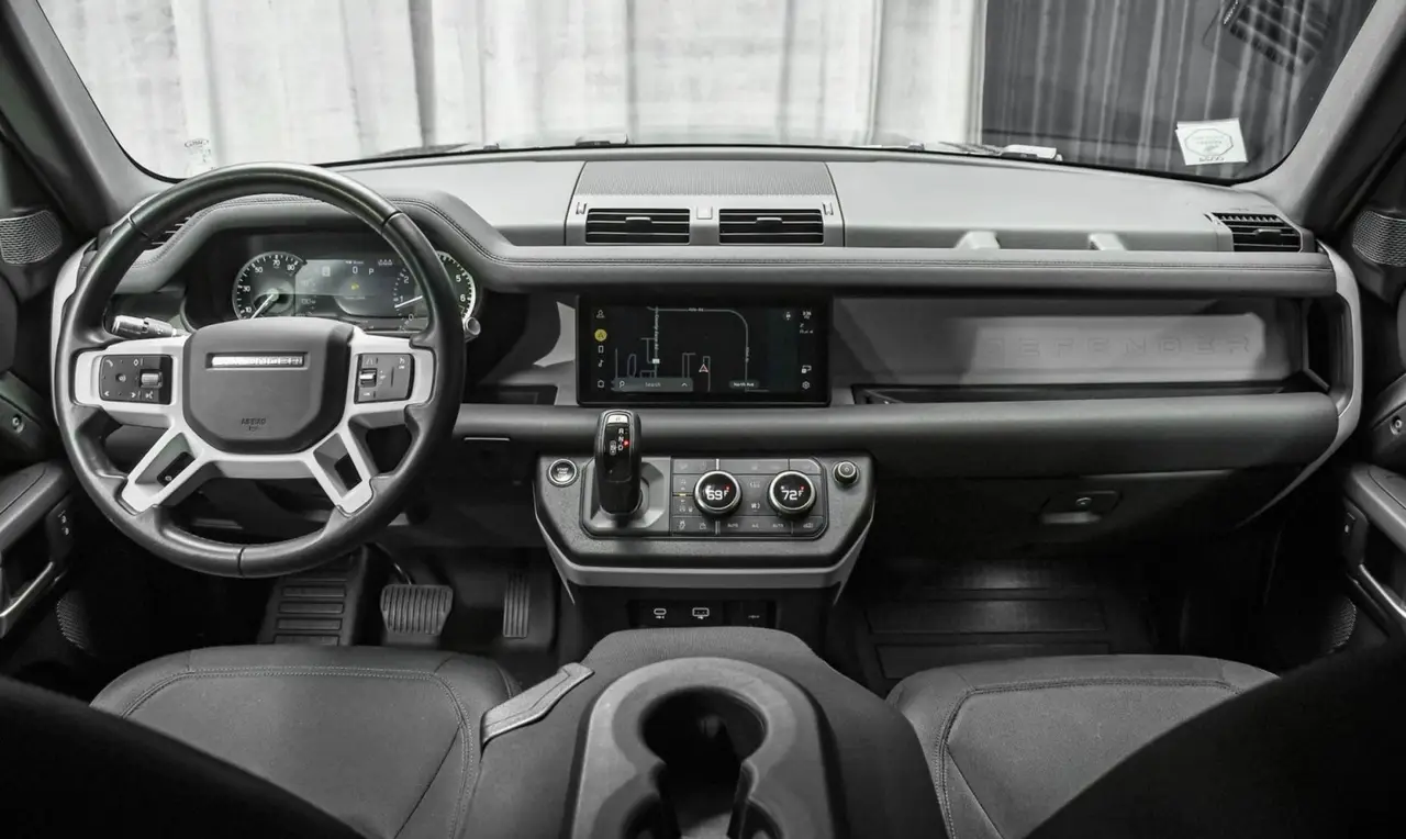 Land Rover Defender X-Dynamic 7 seater 2024, dashboard — Barcelona Luxury Car Rental, Barcelona. The 2024 Land Rover Defender X-Dynamic seats seven and carries its 300 hp with the…