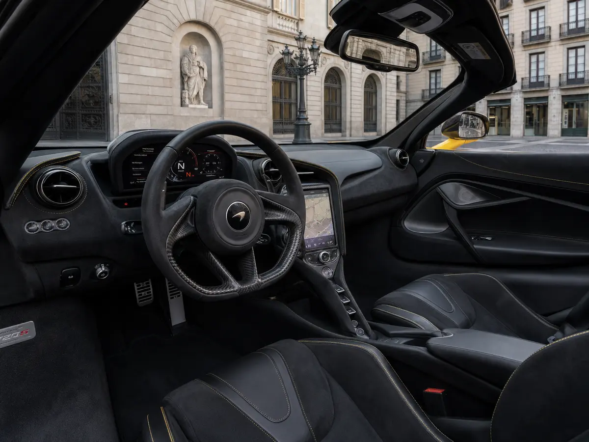 McLaren 720S Spider 2022, interior — Barcelona Luxury Car Rental, Barcelona. The McLaren 720S Spider pairs a 720 hp twin-turbo V8 with a two-seat carbon cockpit built…