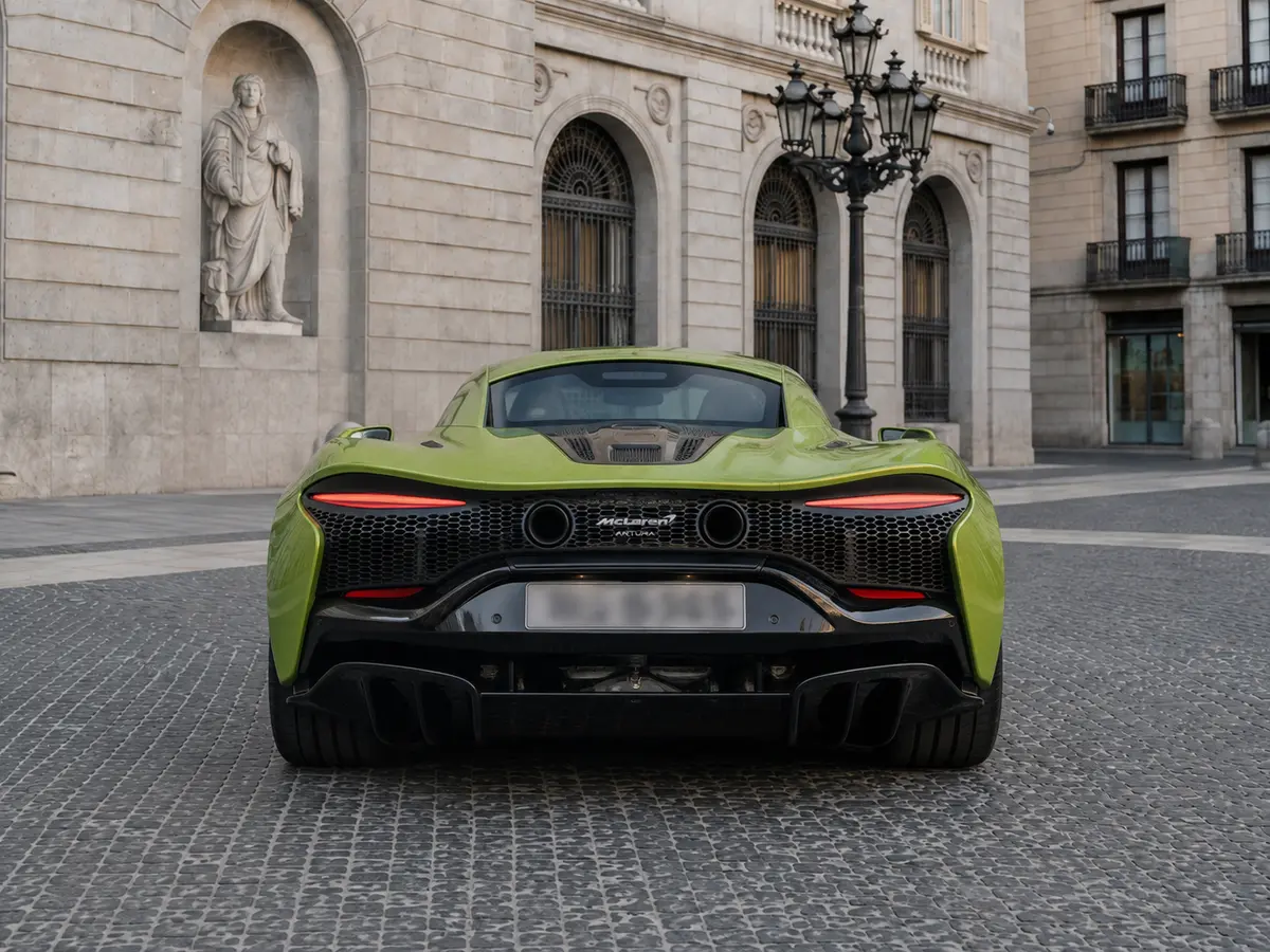 McLaren Artura Spider 2024, rear view — Barcelona Luxury Car Rental, Barcelona. The McLaren Artura Spider pairs a hybrid V6 with 671 hp in a chassis built for precision…