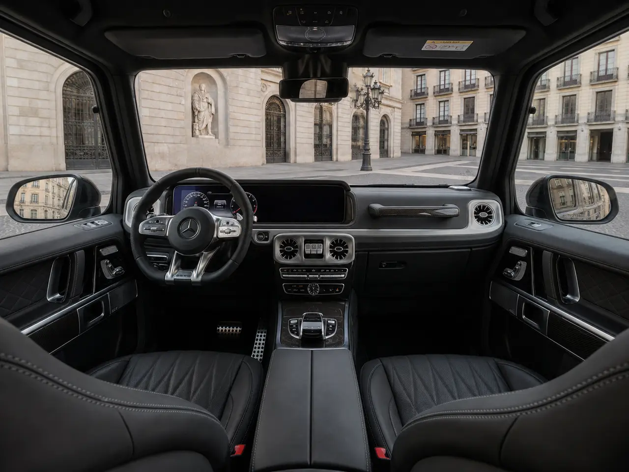 Mercedes Benz G63 2023, rear view — Barcelona Luxury Car Rental, Barcelona. The Mercedes Benz G63 keeps its silhouette almost unchanged from the original G-Wagen,…
