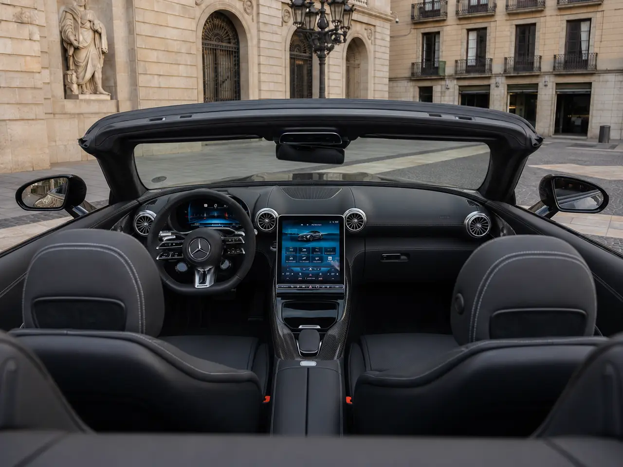 Mercedes Benz SL63 Cabrio 2023, interior — Barcelona Luxury Car Rental, Barcelona. The Mercedes Benz SL63 Cabrio pairs a 585 hp V8 with the folding hardtop mechanics that…