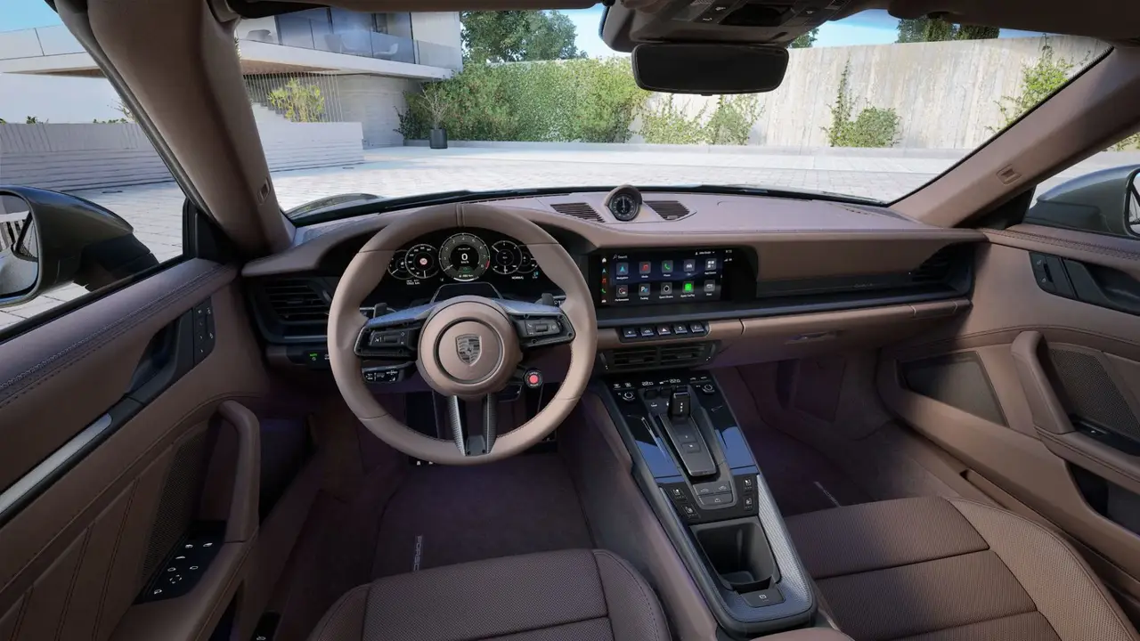 Porsche 911 992 Carrera Turbo S Cabrio 2026, rear view — Barcelona Luxury Car Rental, Barcelona. The 2026 Porsche 911 992 Carrera Turbo S Cabrio pairs 650 hp with the folding roof that…