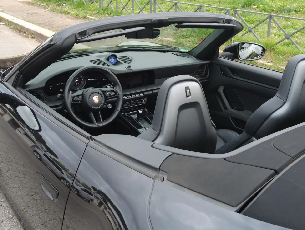 Porsche 992 Carrera 4 GTS Cabrio 2024, interior — Barcelona Luxury Car Rental, Barcelona. The 992-generation Carrera 4 GTS Cabrio sits at the point where Porsche's engineering…