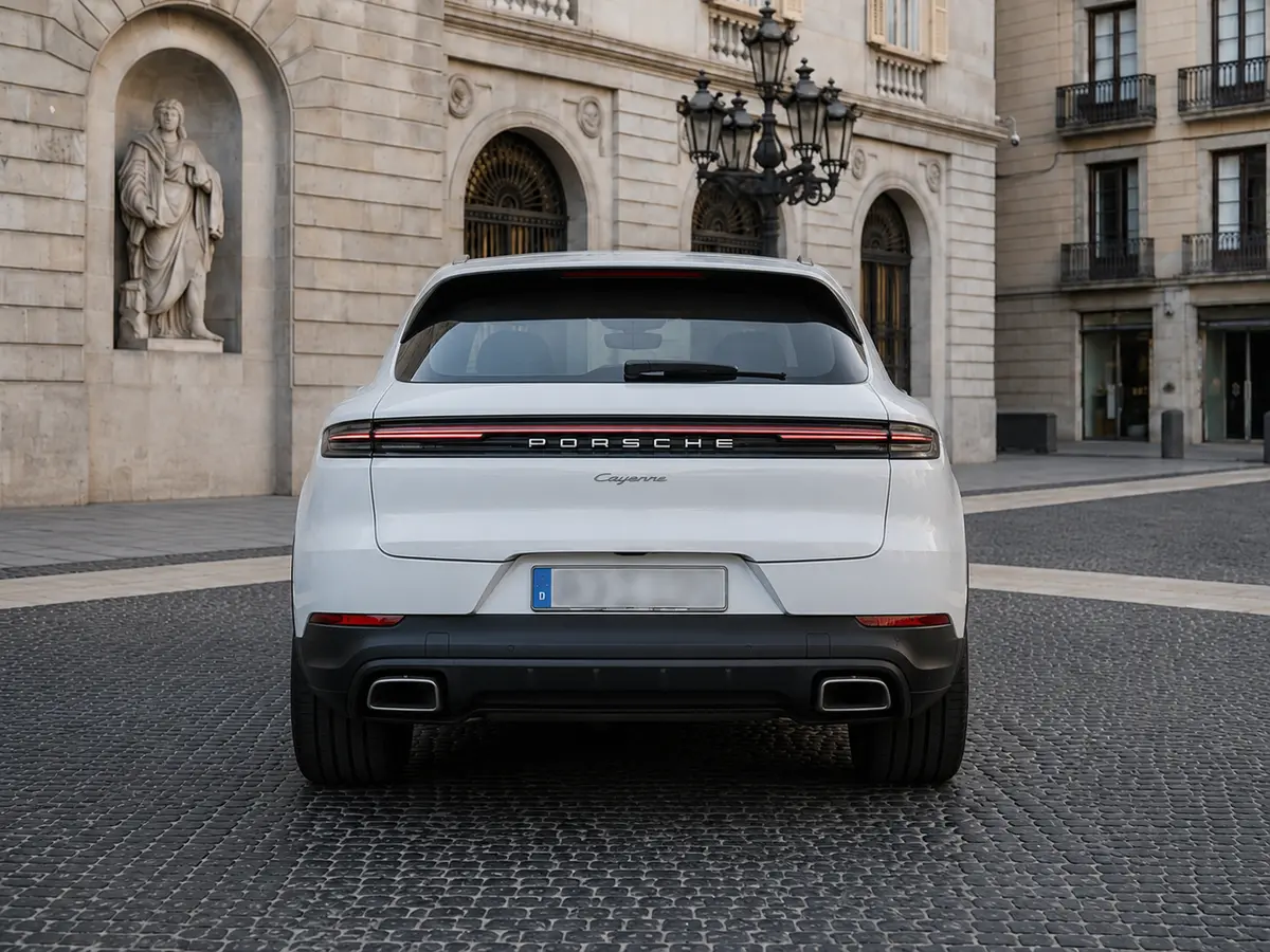 Porsche Cayenne 2025, rear view — Barcelona Luxury Car Rental, Barcelona. The 2025 Porsche Cayenne pairs a 353 hp drivetrain with the composed, planted handling…