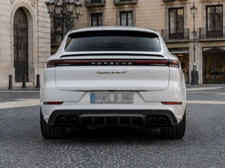 Porsche Cayenne Turbo E-Hybrid Coupé GT 2026, rear view — Barcelona Luxury Car Rental, Barcelona. The Porsche Cayenne Turbo E-Hybrid Coupé GT pairs a coupé roofline with 739 hp from its…