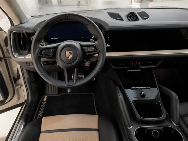 Porsche Cayenne Turbo E-Hybrid Coupé GT 2026, interior — Barcelona Luxury Car Rental, Barcelona. The Porsche Cayenne Turbo E-Hybrid Coupé GT pairs a coupé roofline with 739 hp from its…