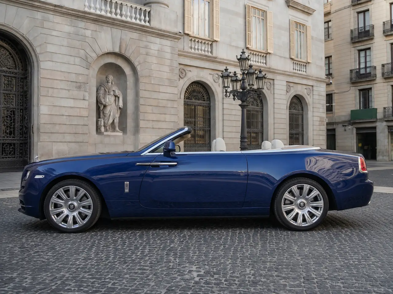 Rolls-Royce Dawn 2022, exterior — Barcelona Luxury Car Rental, Barcelona. The Rolls-Royce Dawn carries its 563 hp with the kind of unhurried authority that defines…