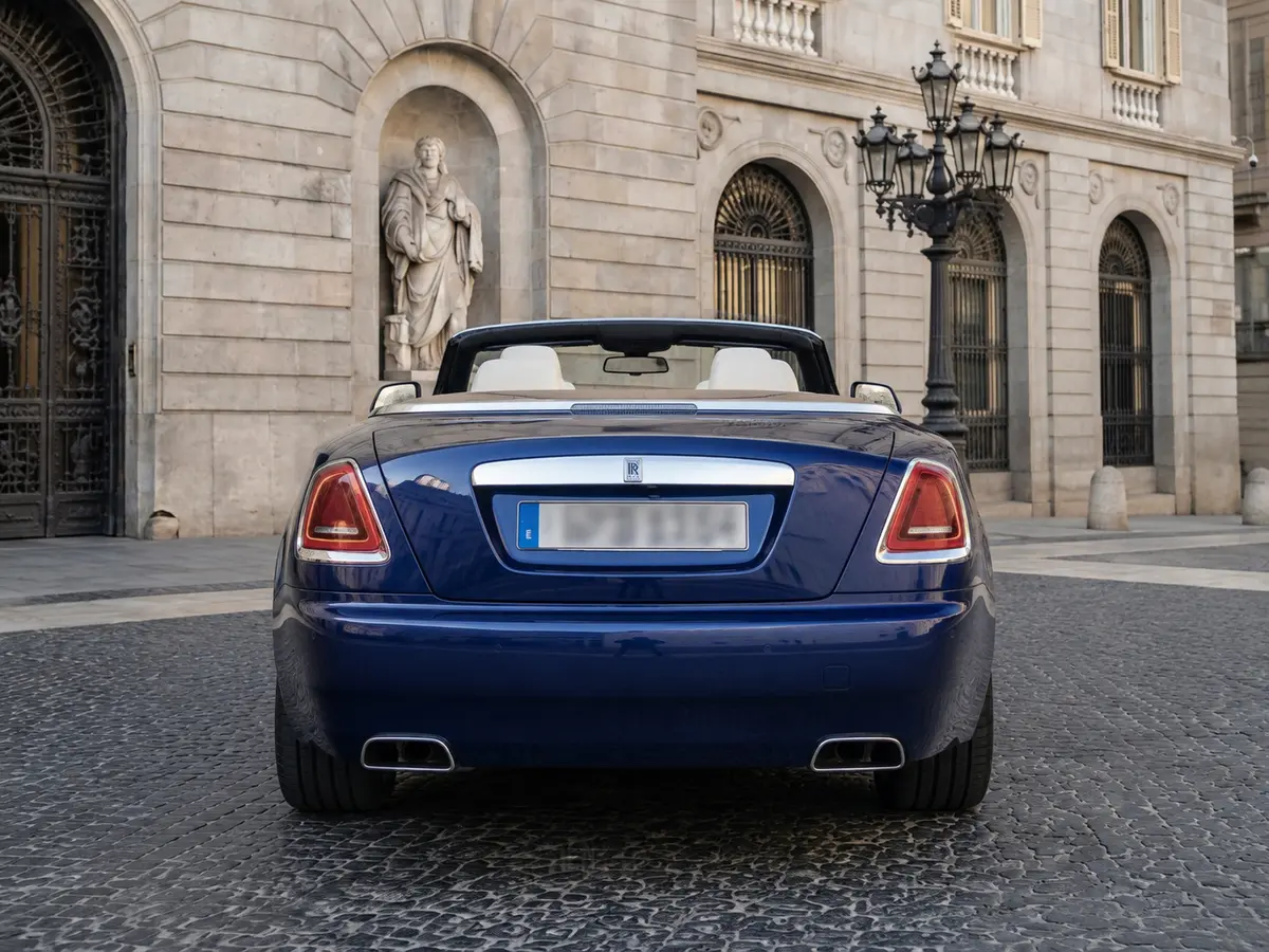 Rolls-Royce Dawn 2022, rear view — Barcelona Luxury Car Rental, Barcelona. The Rolls-Royce Dawn carries its 563 hp with the kind of unhurried authority that defines…