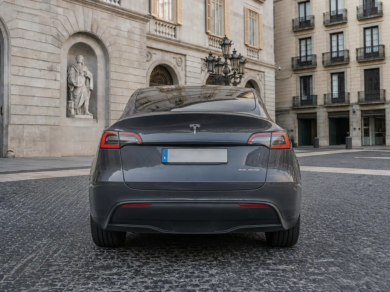 Tesla Model Y Long Range 2023, rear view — Barcelona Luxury Car Rental, Barcelona. The 2023 Tesla Model Y Long Range pairs 378 hp with the smooth, immediate delivery…